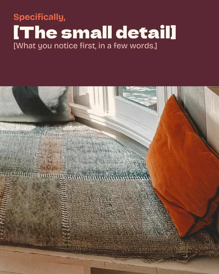 Specifically, [The small detail]. [What you notice first, in a few words.] A close crop of a tomato-orange cushion leaning against a white window sash on a patchwork seat.
