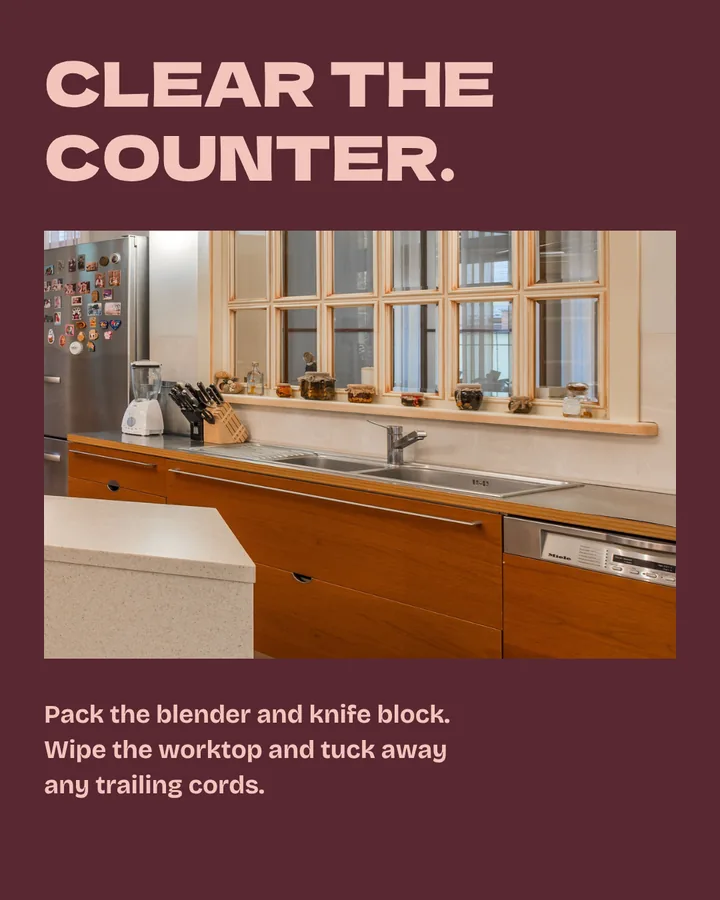 Clear the counter. A close crop of the same kitchen shows a blender and knife block beside the sink. Pack these, wipe the worktop and tuck away any trailing cords.